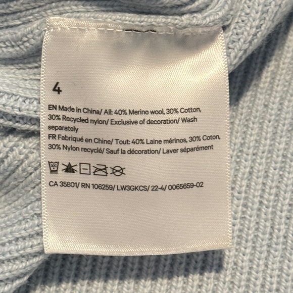 Lululemon Merino Wool-Blend Ribbed
Turtleneck Sweater • Powder Blue • Size 4 - Picture 16 of 16